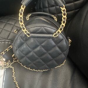 CHANEL Black Quilted Mini Bag with Gold Chain